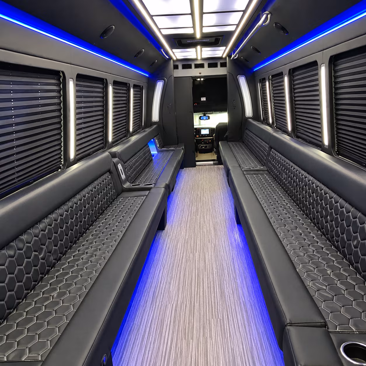 Group beside a Mercedes Sprinter limo in Abilene